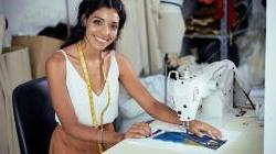 Seamstress working on sewing machine